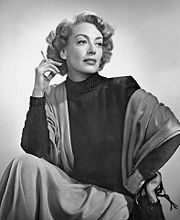 Quote by Joan Crawford: “Love is a fire. But whether it is going to ...