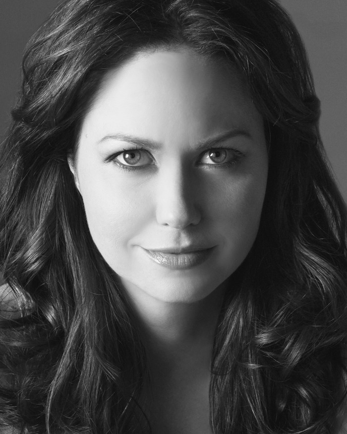Tiffany Romigh (Author of Elasticity)