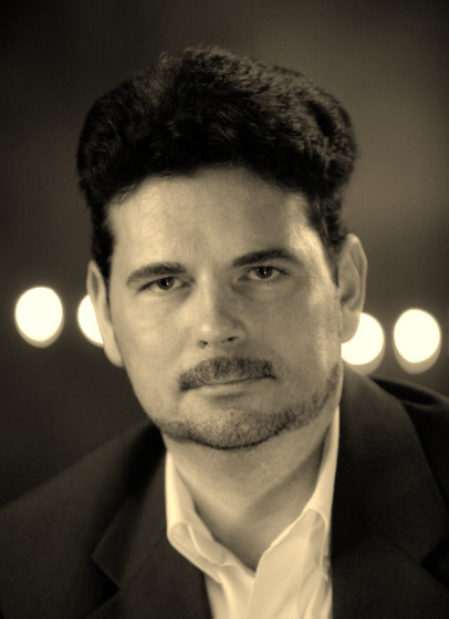 A.X. Rhodes (Author of In the Light of Darkness)
