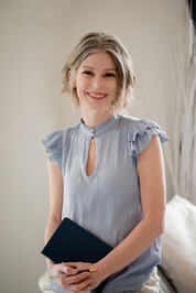 Kathryn        White