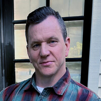 Evan     Harris