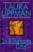 In a Strange City (Tess Monaghan Novel) by Laura Lippman