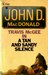 A Tan and Sandy Silence by John D. MacDonald