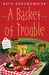 A Basket of Trouble (Claire Hanover, Gift Basket Designer, #3) by Beth Groundwater