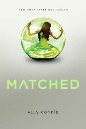 The cover of Matched. A girl with pale skin and dark hair, wearing a green colored dress, sits in a green colored bubble on a gray background. 