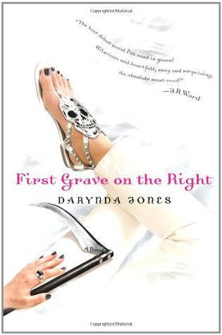 First Grave on the Right book cover (a woman's hand, with rings and black nail polish, holding an ornamental scythe, and a woman's foot, with matching polish and sparkly sandals decorated with a skull)