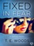 Fixed in Fear (Mort Grant #5) by T.E. Woods