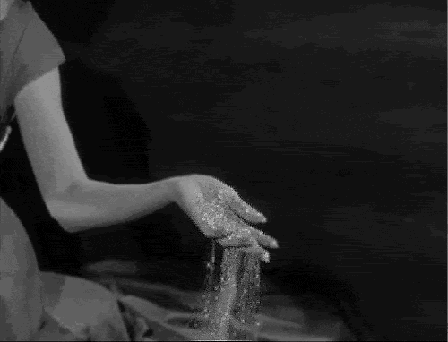  photo sandthroughfingers.gif