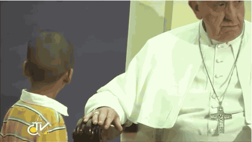 Boy Wanders Onto Stage To Hang Out With Pope Francis