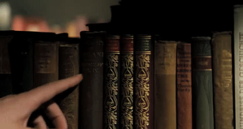 choosing-books-gif