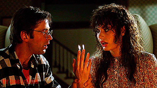The recently deceased Adam and Barbara Maitland (Alec Baldwin, Geena Davis)