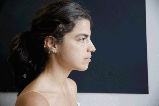 leandra-hair-tuck-gif-man-repeller