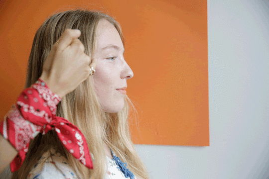 emma-hair-tuck-gif-man-repeller
