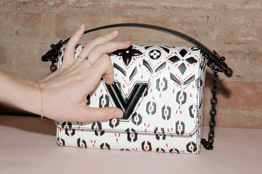 logos-are-back-louis-vuitton-gucci-prada-man-repeller-bags-opening-clasp