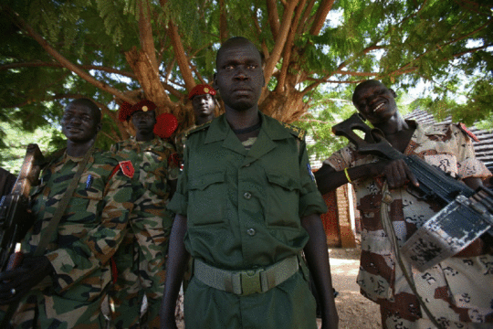 Guards at General Matip's compound. ©McKenzie Funk