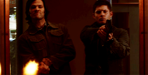 guns shooting photo: Sam and Dean firing guns supernatural_gif_9_by_orangeeyededen-d58xii7_zps8370a79a.gif