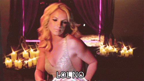 A gif of Britney Spears in a beautiful, tight white dress looking disgusted, standing up, and walking away. At the bottom of the image it says, 