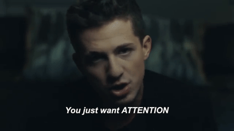 Charlie Puth from his music video, singing the 