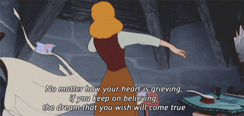 An animation of Disney's Cinderella with birds tying the bow on her apron. The words 