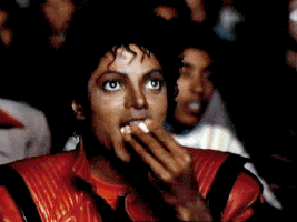 Legendary animated gif of Michael Jackson eating popcorn