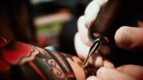 tattoo artist gif