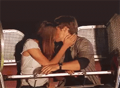 kissing on a ferris wheel gif