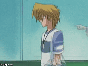 GIF of Tea Gardner from Yugioh The Abridged Series grabbing Joey's ear and saying I am very disappoint!
