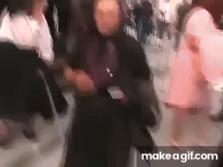 Old biddy kisses microphone