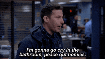 gif of Jake Peralta, a character played by Andy Samberg, saying, 'I'm gonna go cry in the bathroom, peace out, homies.'
