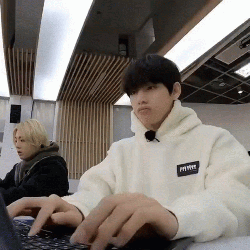 gif of bts v typing and suddenly shocked