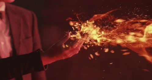 GIF of a hand shooting sparks