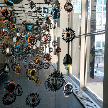 an installation of mobiles in the Nick Cave Forothermore show at the MCA