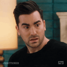 The character of David Rose from Schitt's Creek looks open mouthed and shocked.