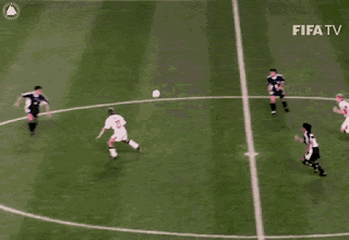 A gif of an England goal, being scored against Argentina in 1998 by Michael Owen. He has the ball from just after the half way line, and runs with it, evading the opposition, to the goal.