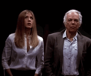A gif from Friends. Rachel (Jennifer Aniston) is in a lift at work, when her big boss, Ralph Lauren (played by ralph Lauren) gets in. He looks straight ahead and ignores her. She looks awkward, not knowing what to say.