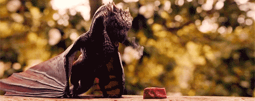 baby dragon breathing smoke