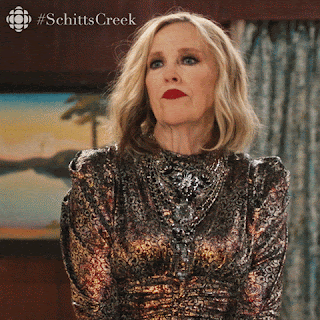 Moira Rose from Schitt's Creek says, 'Perhaps a little more housework and a little less housework' whilst miming using a computer mouse.