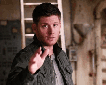 Dean Winchester winking and pointing