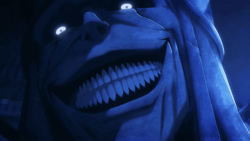 a close up of a monster 's face with glowing eyes and teeth