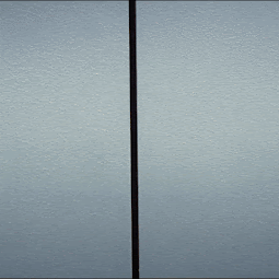 Meryl Streep as Miranda Priestly is coming out of an elevator. As the door open, and she walks out, the back wall of the elevator has the words, It's My Birthday' in white.