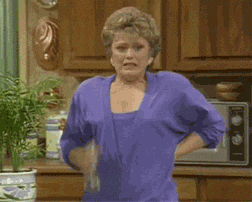 Blanche from the Golden Girls sprays herself with a water mister as if she's massively turned on my something.