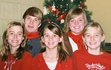 This is my family's Christmas picture last year. That's me on the bottom left!