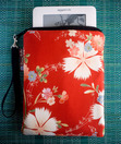 <a href="http://www.borsabella.com/" target="_new">Borsa Bella</a>also makes an extra padded sleeve for naked kindles.