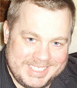 R. Scott McCoy was born in Kodiak Alaska and raised in Bemidji Minnesota. He currently lives in the northern suburbs of the Twin Cities with his family. He's had more than twenty short stories published in a variety of magazines and anthologies. His 1st Novel, Feast, was released from Shroud Publishing in September 2009 and his 2nd novel The White Faced Bear was released from Belfire Press in October 2010.Scott owns Stygian Publications, was the editor of Necrotic Tissue and is an Affiliate Member of the HWA