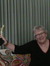 Betty Dravis with statue given by author Joanna Lee Doster