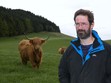 James Oswald and one of his highland cows at his farm in Fife! 
