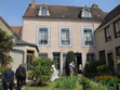 Prof Bill Carter leading a group of Proustians during a tour of the Proust Museum (Maison de Tante Leonie) in Illiers-Combray during May 2015.