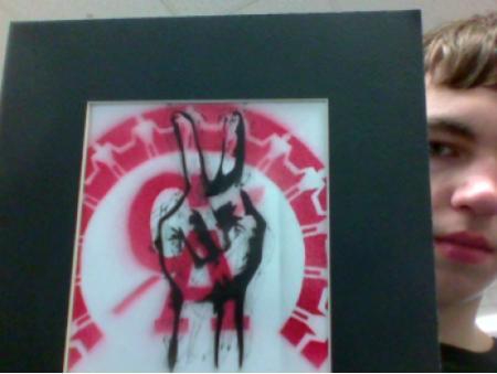 I made this in my IB art class<br />I made and vandalized my schools logo using airbrush