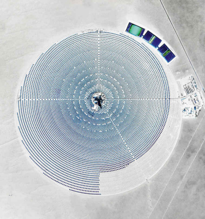 blue concentric circles of dots on a grey surface