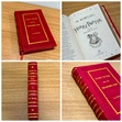 The leather-bound edition of "Harry Potter and the Philosopher's Stone" presents an exquisite fusion of craftsmanship and literary magic. 
When you see a leather-bound Harry Potter book with a red cover, it's not just about looking fancy. The red color actually means something. It represents bravery and courage, like what you see in Gryffindor House at Hogwarts. You know the house Harry, Ron, and Hermione are in. So, it's like a nod to the adventurous and daring spirit of the characters. Plus, having it in leather just adds to the whole classy vibe of the book.